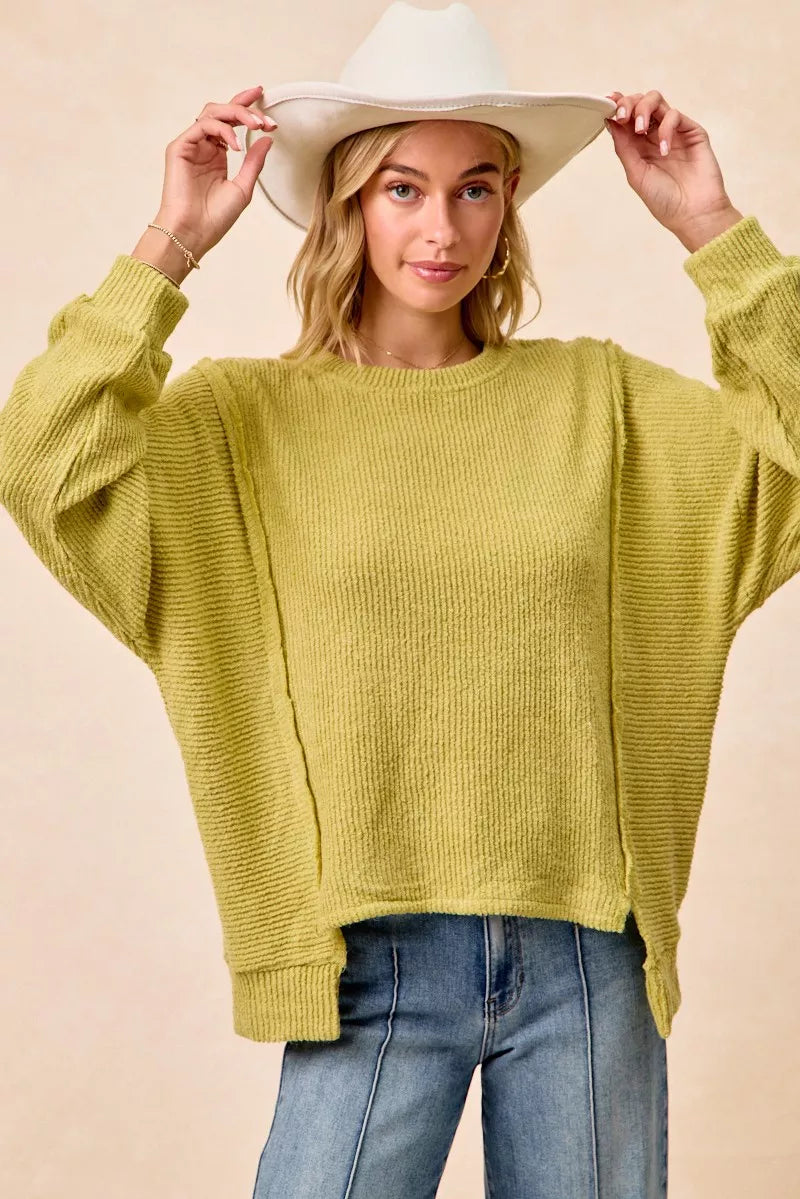 BIBI Boucle Rib Knit Uneven Hem Sweater With Open Seam on Simply Obsessed