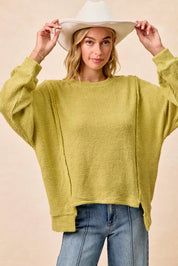 BIBI Boucle Rib Knit Uneven Hem Sweater With Open Seam on Simply Obsessed