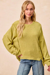 BIBI Boucle Rib Knit Uneven Hem Sweater With Open Seam on Simply Obsessed