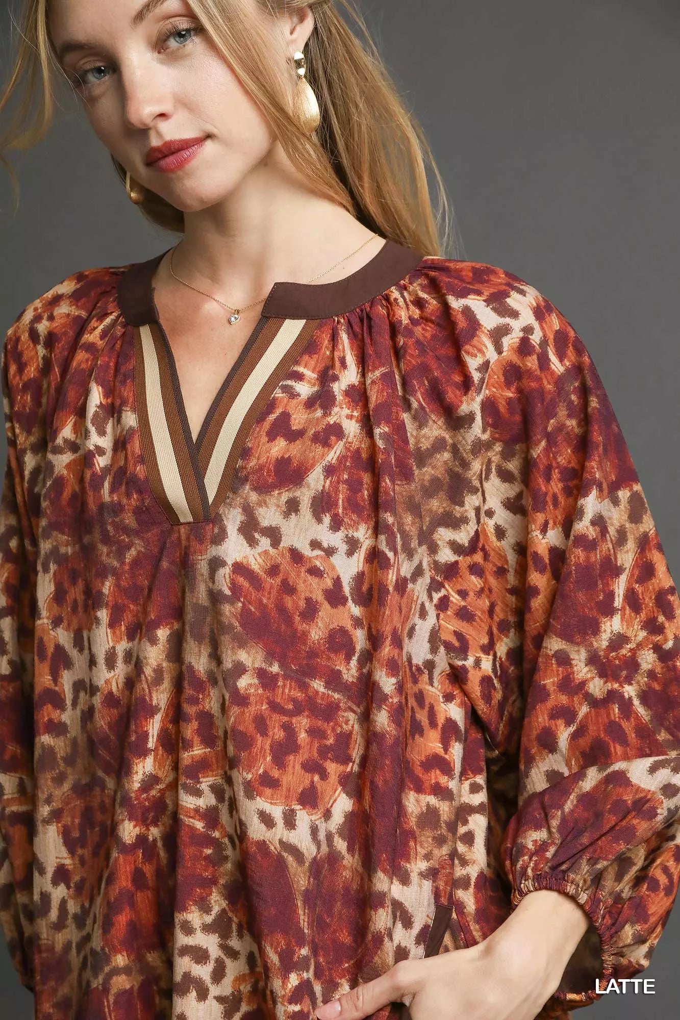 UMGEE Animal Print Boho Tunic Dress with Contrast Trim Detail on Simply Obsessed