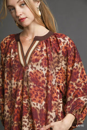 UMGEE Animal Print Boho Tunic Dress with Contrast Trim Detail on Simply Obsessed