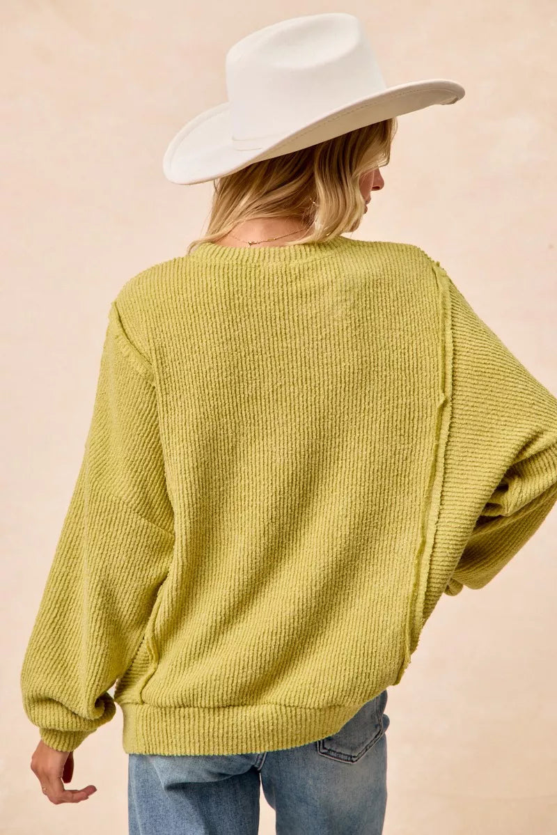 BIBI Boucle Rib Knit Uneven Hem Sweater With Open Seam on Simply Obsessed
