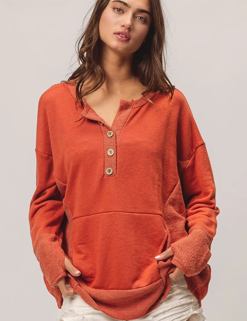 BiBi French Terry Knit Side Block Buttoned Henley Top on Simply Obsessed