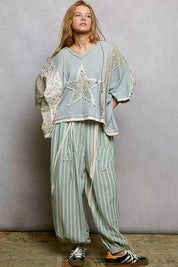 POL Floral Star Patch Hooded Blouse with Lace Contrast Detail on Simply Obsessed