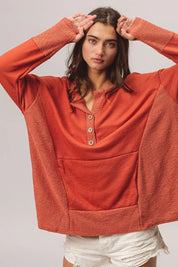 BiBi French Terry Knit Side Block Buttoned Henley Top on Simply Obsessed