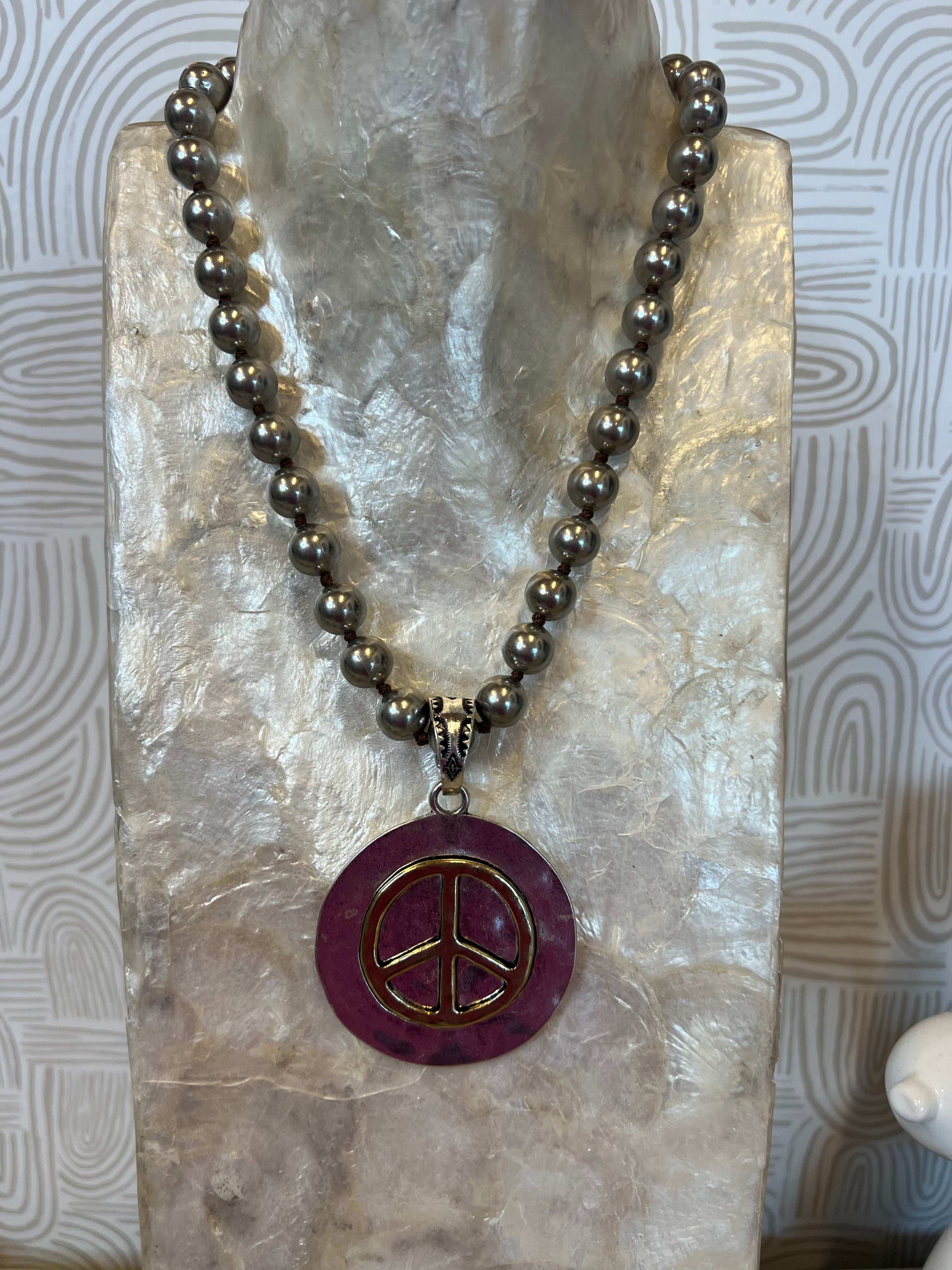 JEWELRY SALE Mixed Metal Peace Sign on Navajo Pearl Necklace on Simply Obsessed