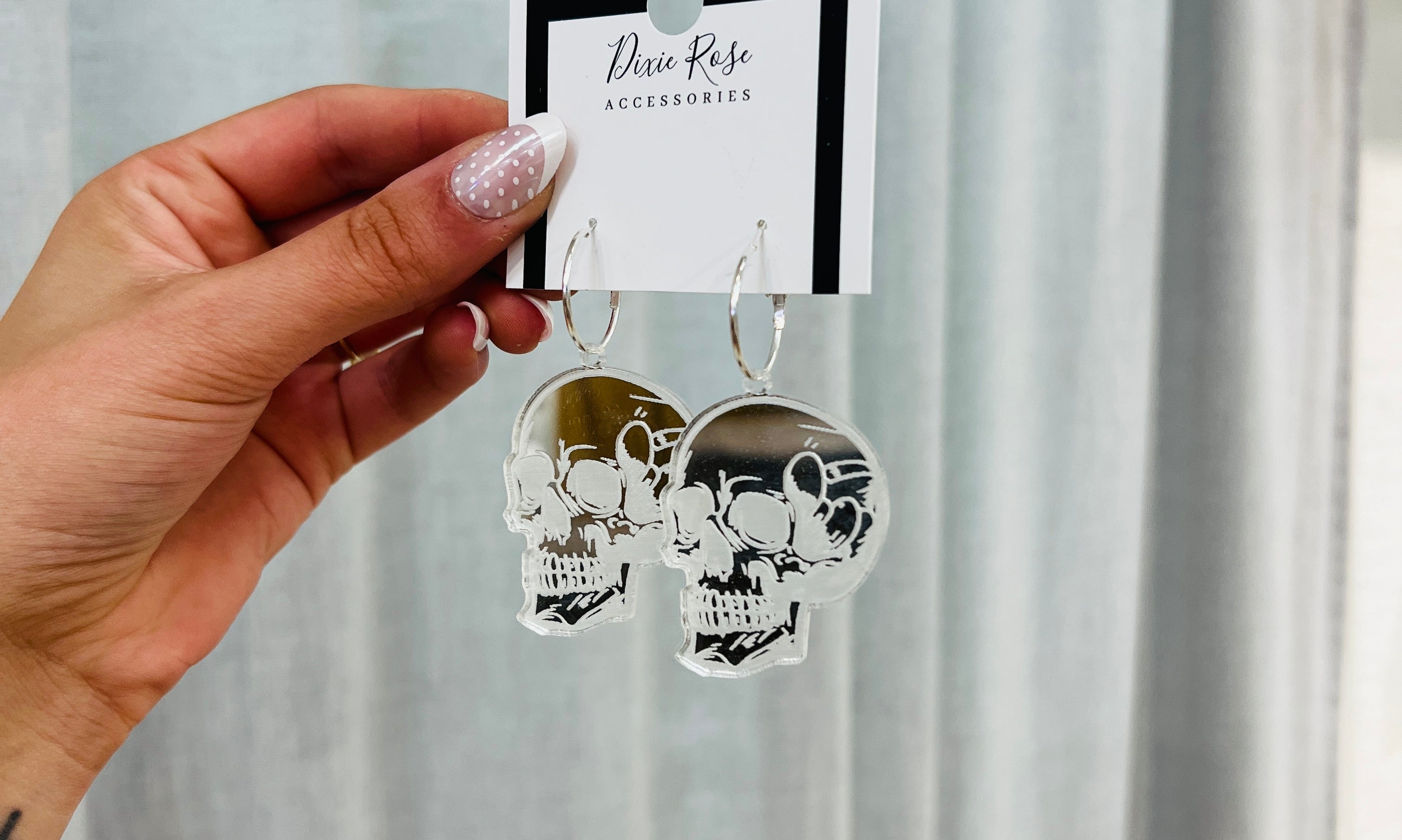 DIXIE ROSE Silver Mirrored Skull Earrings on Simply Obsessed