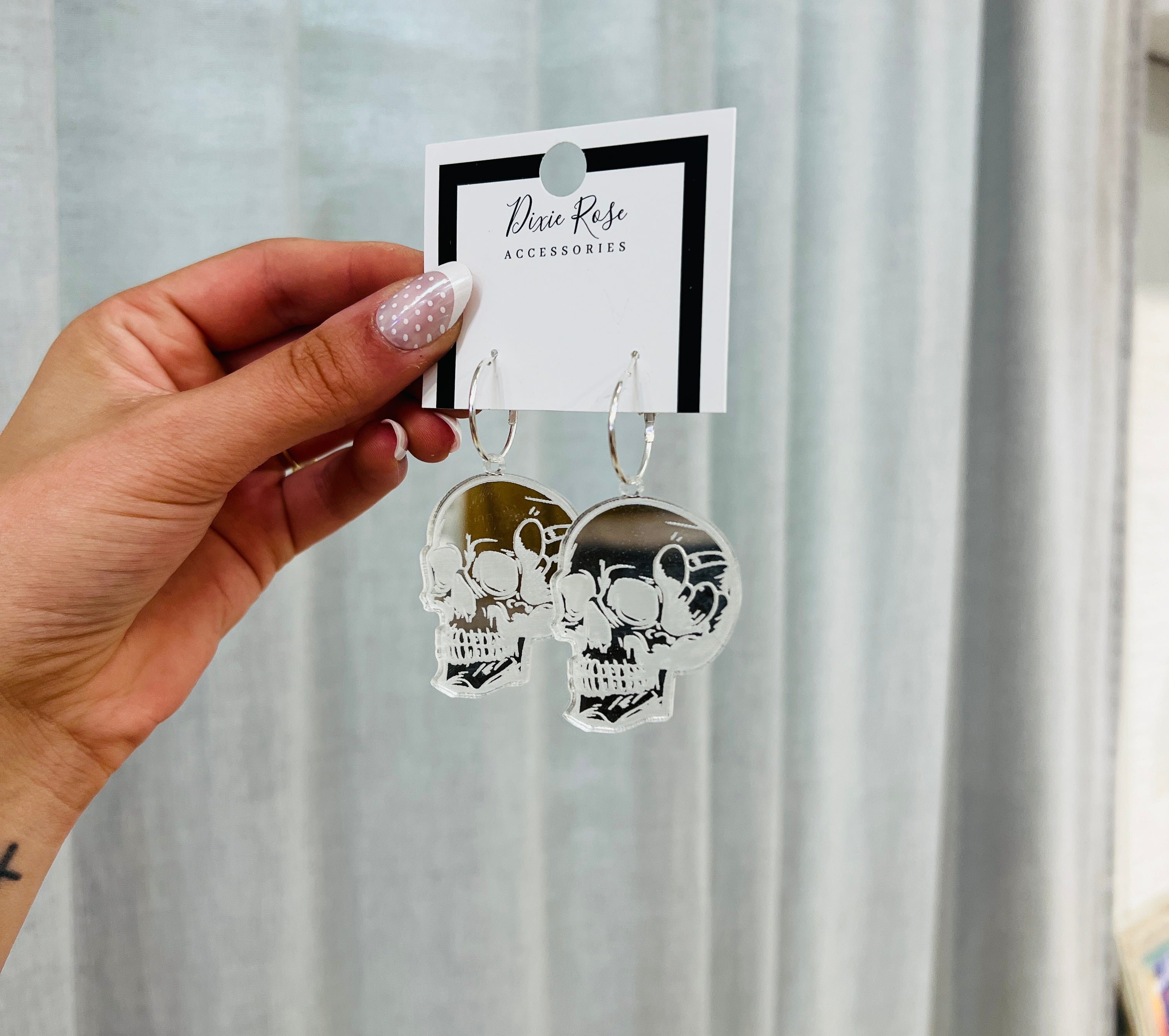 DIXIE ROSE Silver Mirrored Skull Earrings on Simply Obsessed
