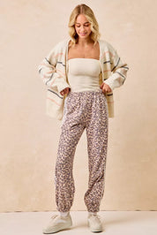 BIBI Side Lines Leopard Track Pants on Simply Obsessed