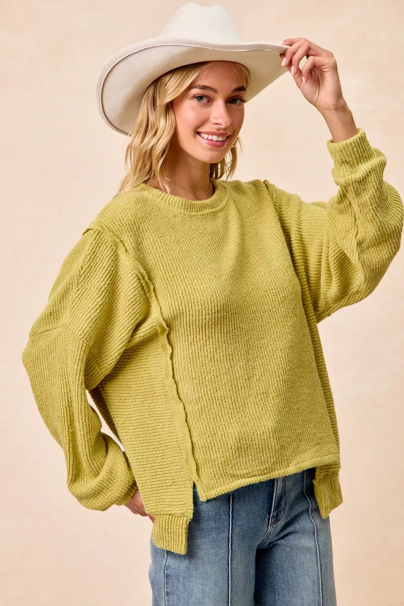 BIBI Boucle Rib Knit Uneven Hem Sweater With Open Seam on Simply Obsessed