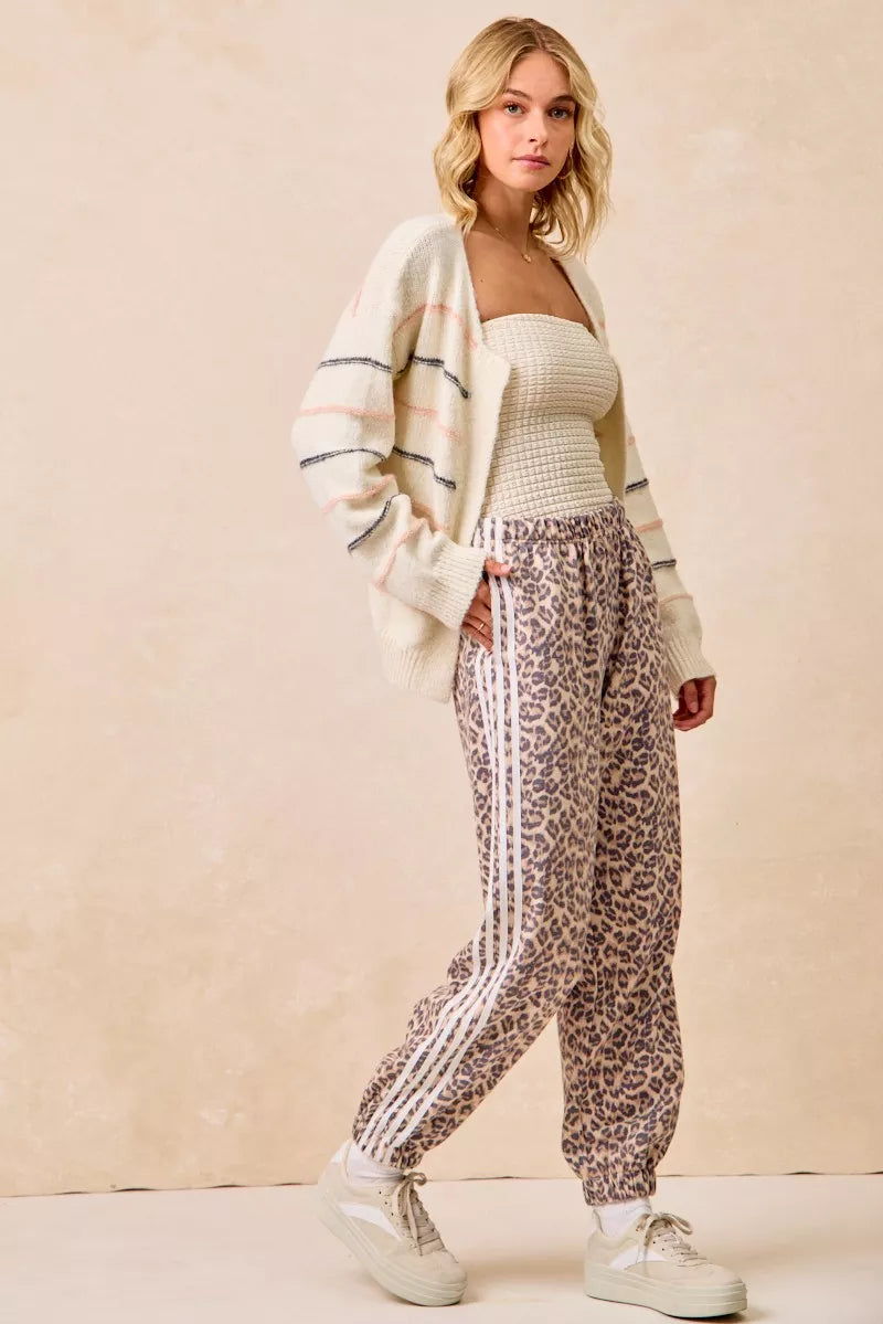 BIBI Side Lines Leopard Track Pants on Simply Obsessed