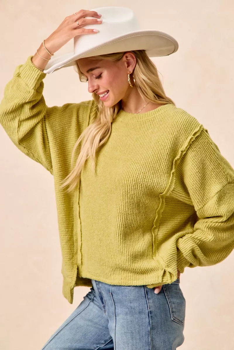 BIBI Boucle Rib Knit Uneven Hem Sweater With Open Seam on Simply Obsessed