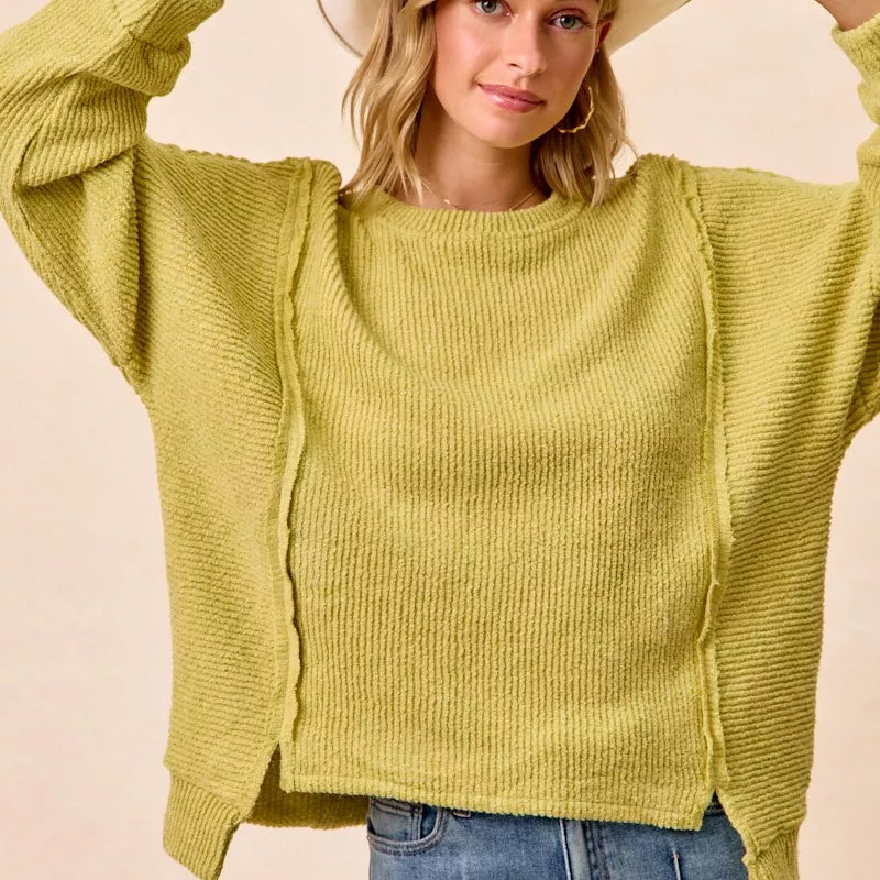 BIBI Boucle Rib Knit Uneven Hem Sweater With Open Seam on Simply Obsessed