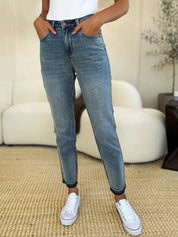 JUDY BLUE Full Size Mid Rise Rigid Magic Release Hem Jeans on Simply Obsessed