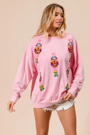 BIBI Sequin Nutcrackers Embroidery Christmas Sweatshirt on Simply Obsessed