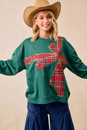 BIBI Plaid Ribbon Bow Detail Christmas Fleece Pullover on Simply Obsessed