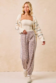 BIBI Side Lines Leopard Track Pants on Simply Obsessed