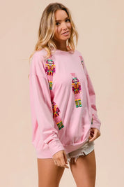 BIBI Sequin Nutcrackers Embroidery Christmas Sweatshirt on Simply Obsessed