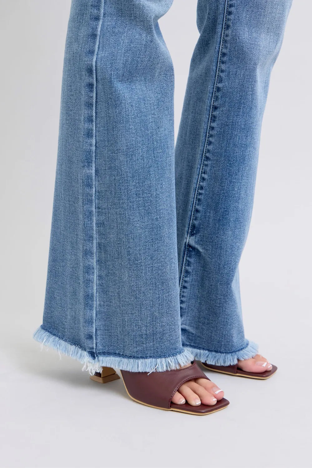 Judy Blue Full Size Raw Hem High Rise Bootcut Jeans on Simply Obsessed