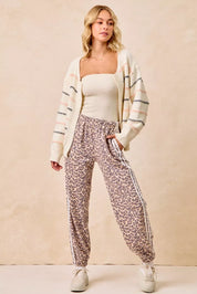 BIBI Side Lines Leopard Track Pants on Simply Obsessed