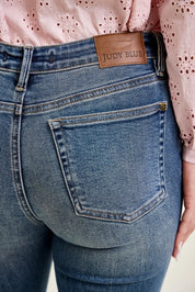 JUDY BLUE Mid Rise Flare Jeans with Front Flap Pockets on Simply Obsessed