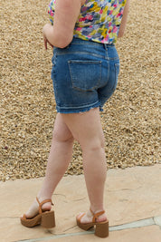 RISEN Maya Full Size Mid Rise Asymmetrical Shorts on Simply Obsessed