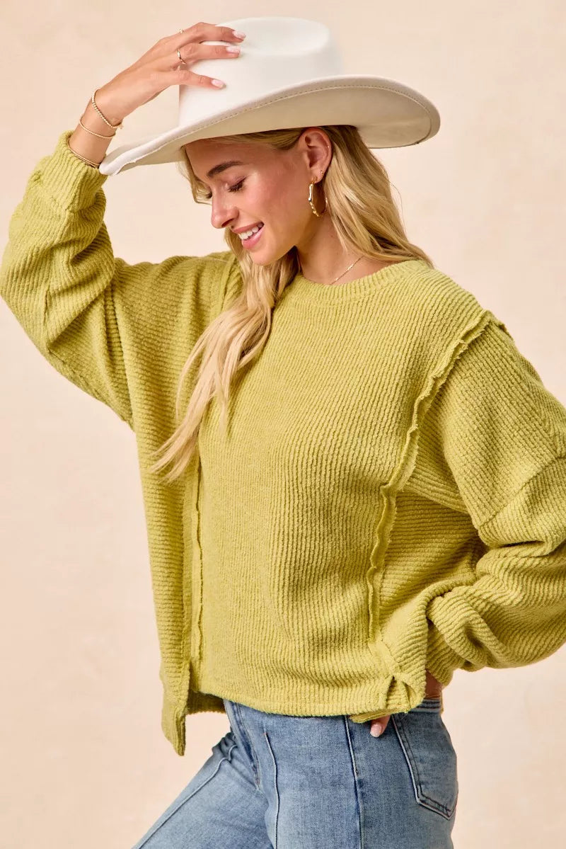 BIBI Boucle Rib Knit Uneven Hem Sweater With Open Seam on Simply Obsessed