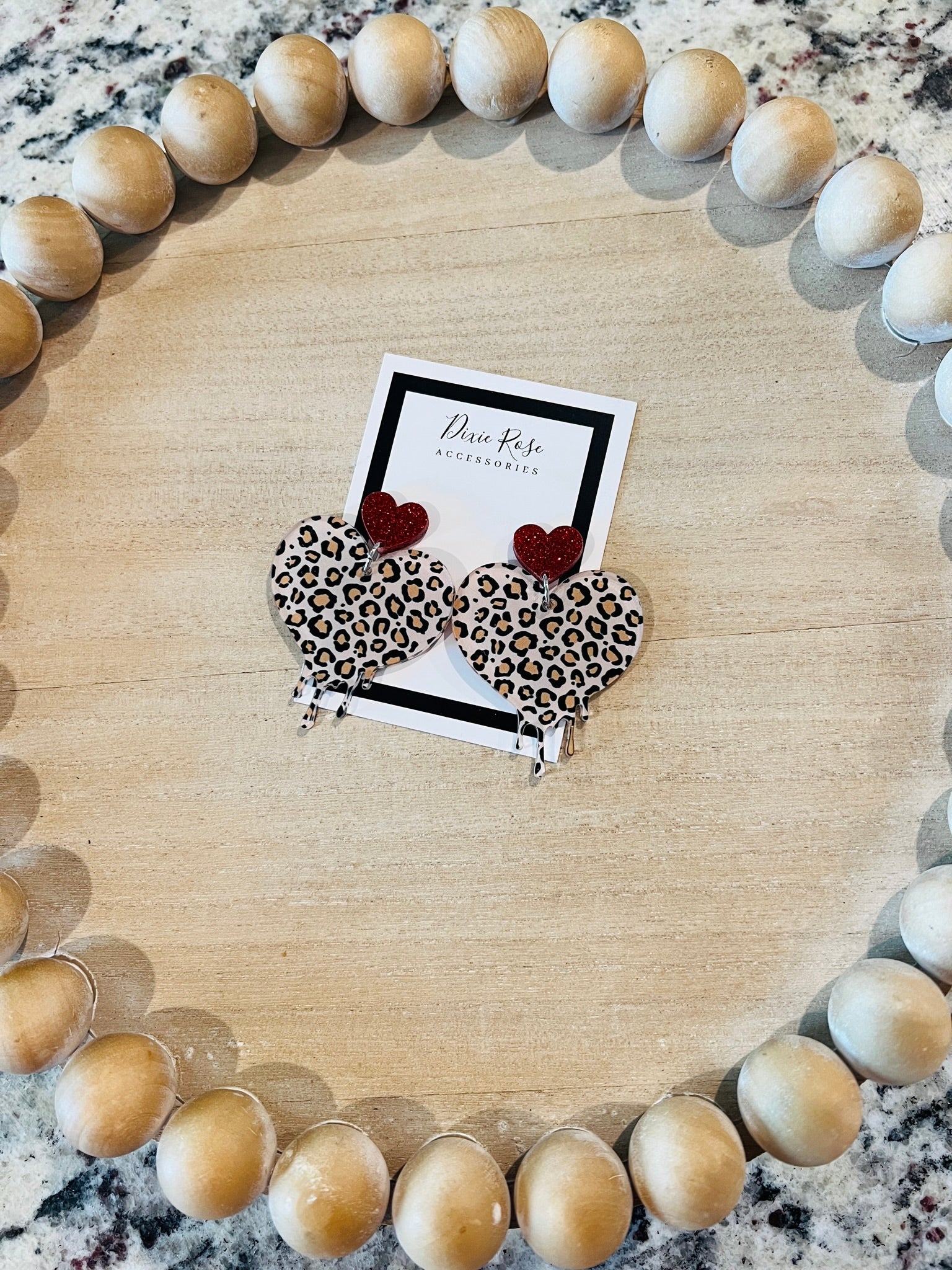 DIXIE ROSE Leopard Melting Heart Earrings on Simply Obsessed