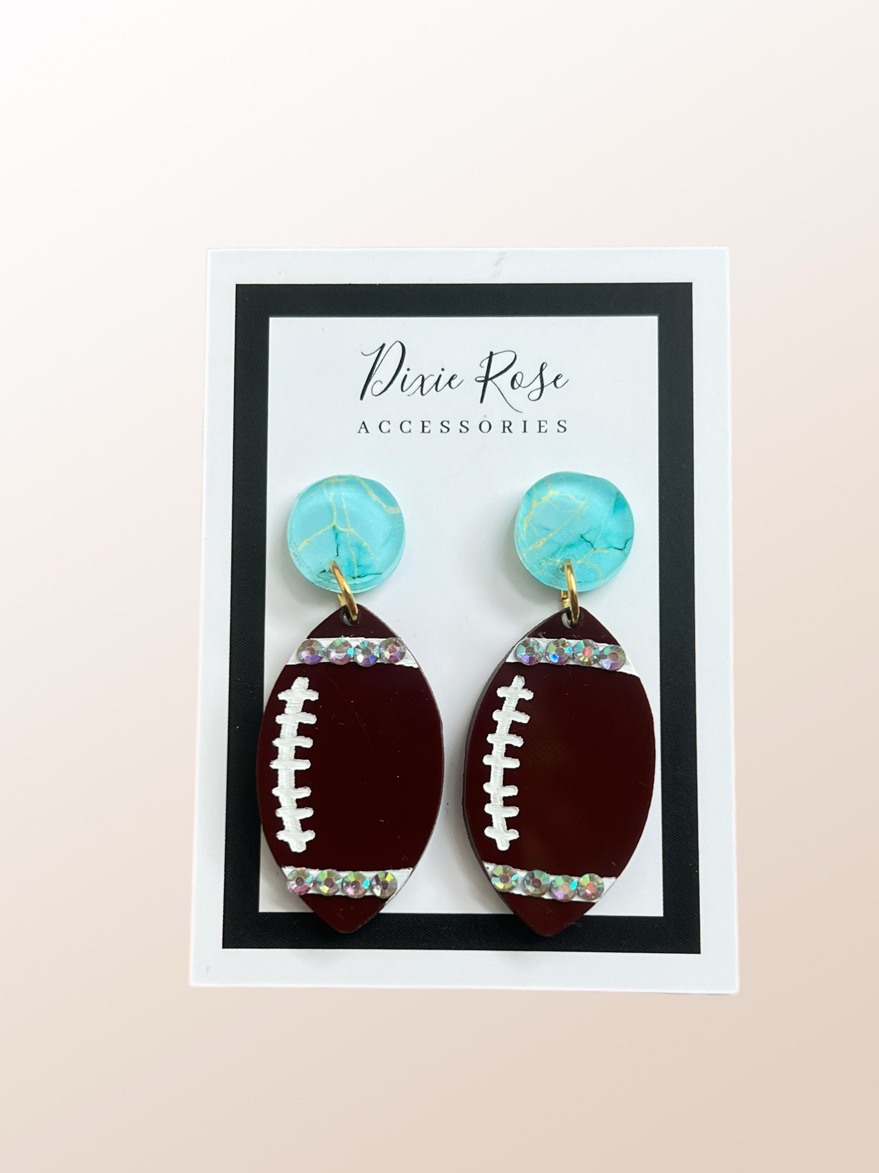 DIXIE ROSE Turquoise Football Crystal Earrings on Simply Obsessed
