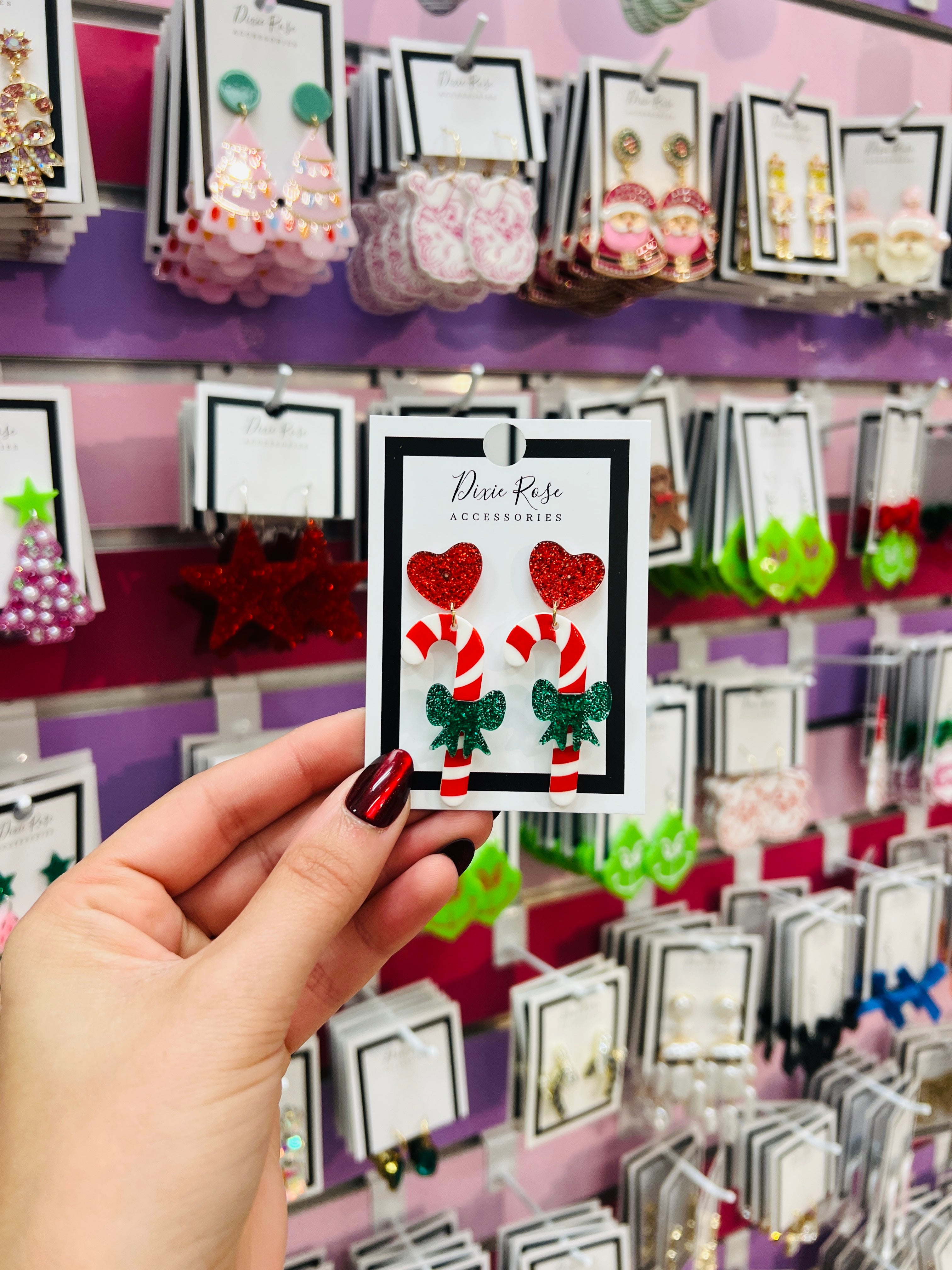 DIXIE ROSE Bow Candy Cane Earrings on Simply Obsessed
