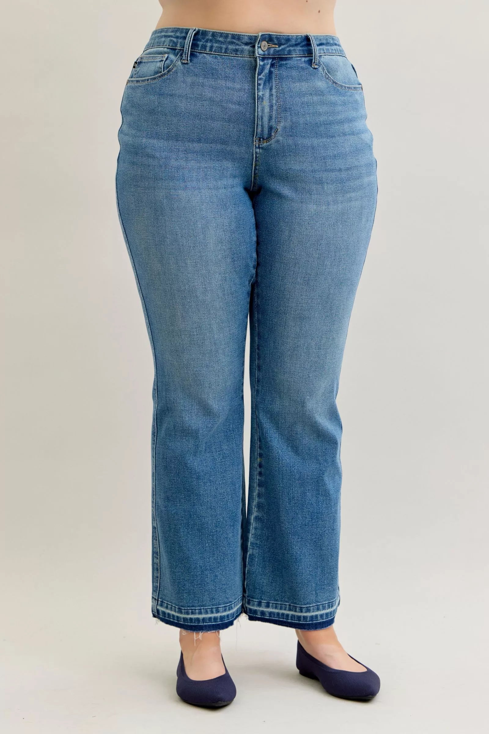 Judy Blue Full Size Mid Rise Slim Bootcut Tummy Control Release Hem Jeans Plus Size on Simply Obsessed