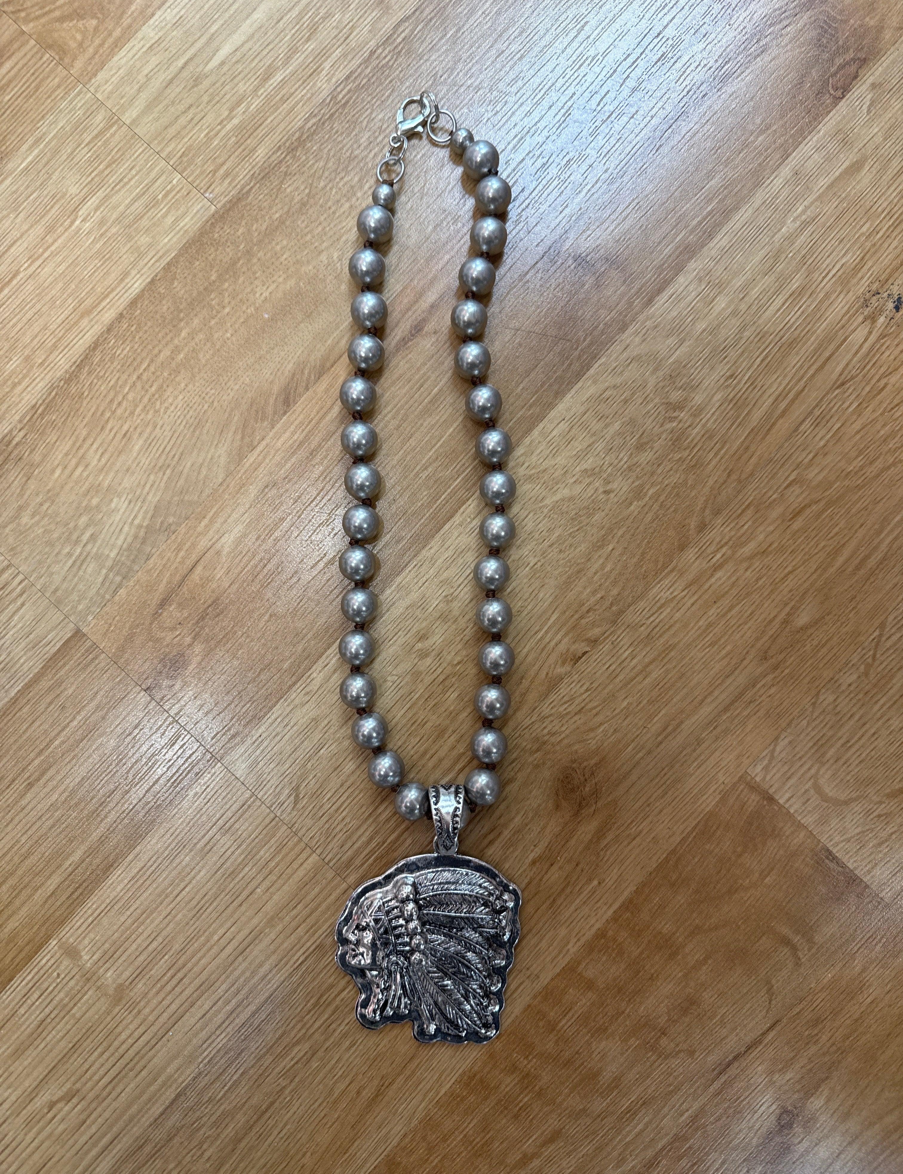 ATG Chiefs Head Necklace on Simply Obsessed