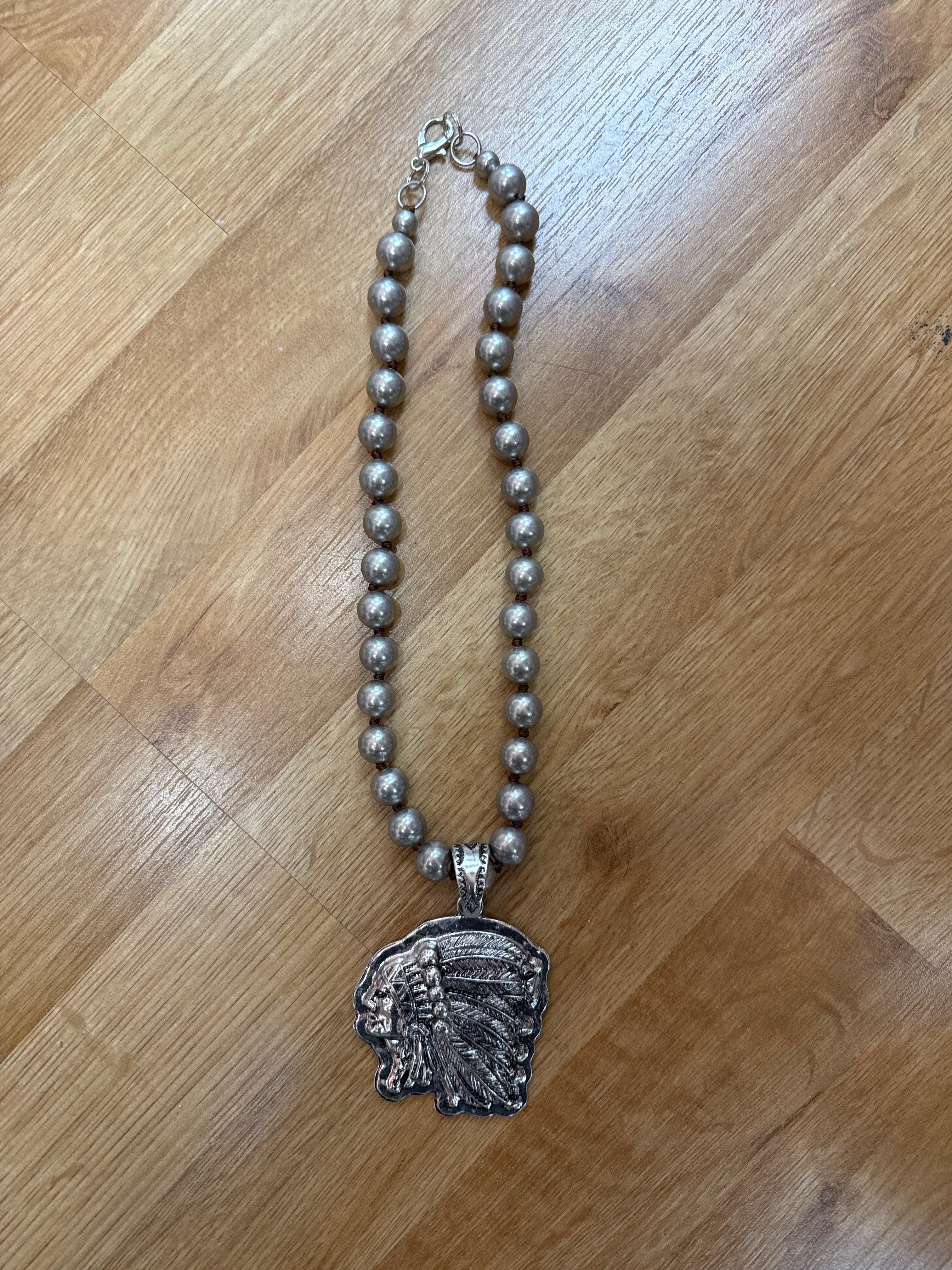 ATG Chiefs Head Necklace on Simply Obsessed