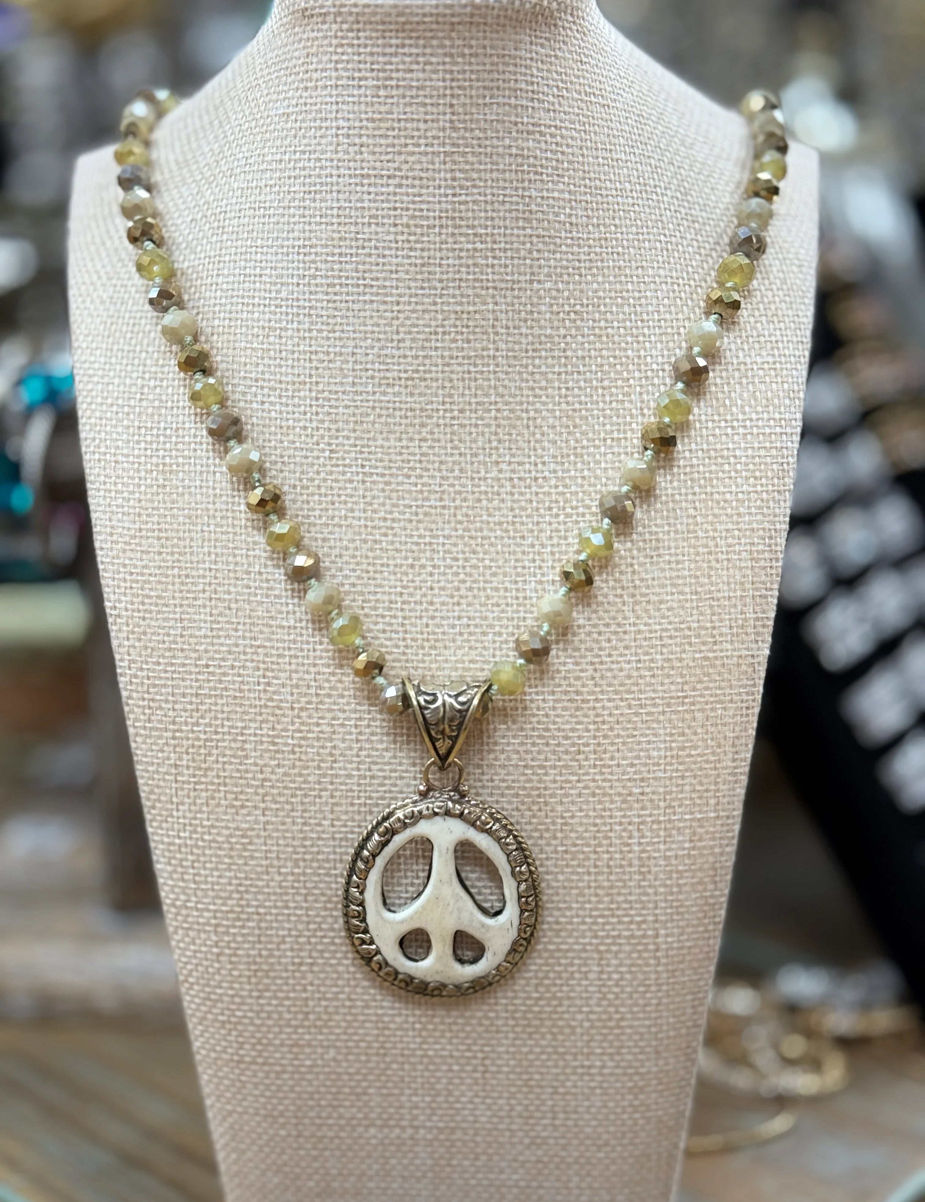 ATG Mixed Neutral Bead Bone Peace Sign Necklace on Simply Obsessed
