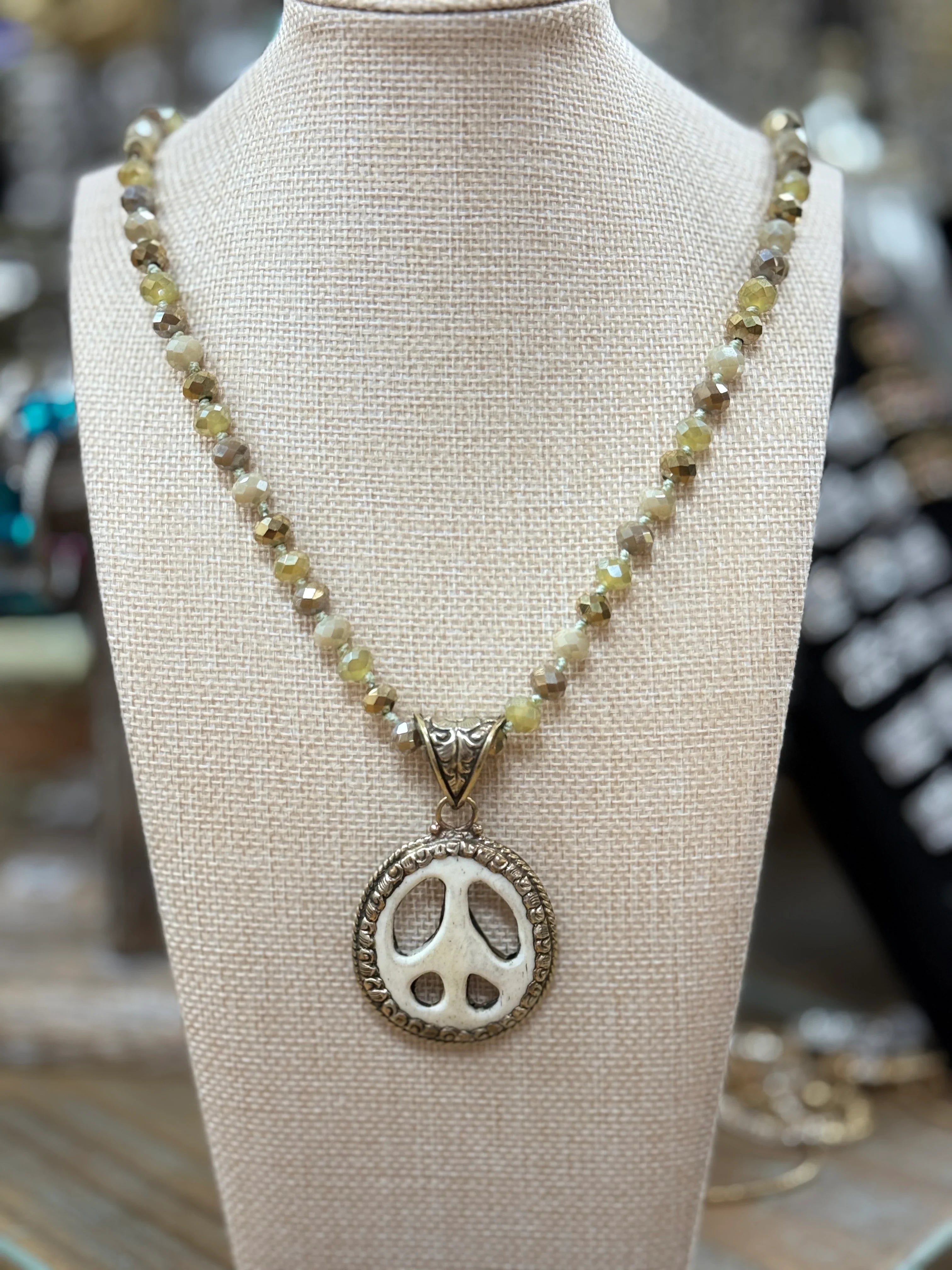 ATG Mixed Neutral Bead Bone Peace Sign Necklace on Simply Obsessed