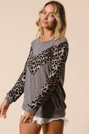 BiBi Sweater Knit Top With Leopard V Shape Block on Simply Obsessed