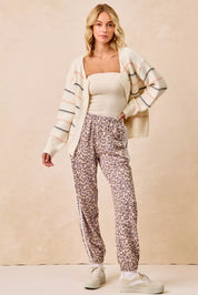 BIBI Side Lines Leopard Track Pants on Simply Obsessed