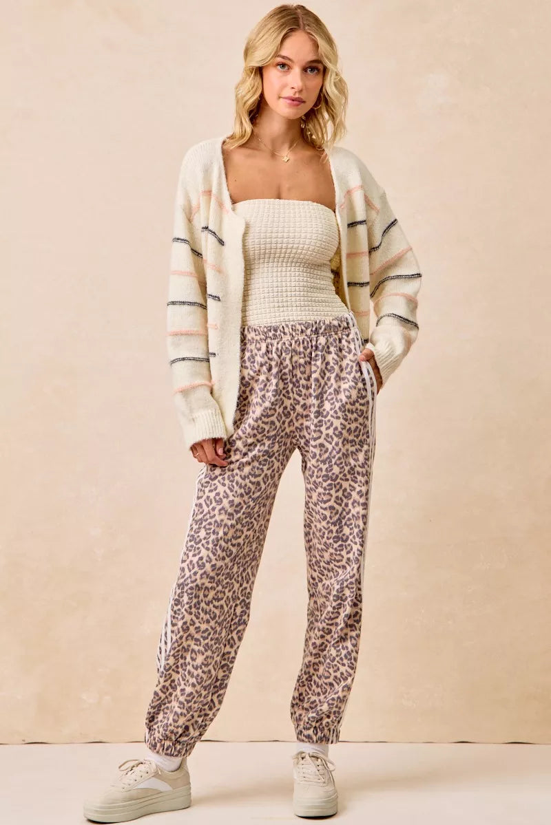 BIBI Side Lines Leopard Track Pants on Simply Obsessed