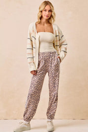 BIBI Side Lines Leopard Track Pants on Simply Obsessed