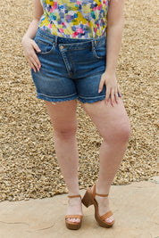 RISEN Maya Full Size Mid Rise Asymmetrical Shorts on Simply Obsessed