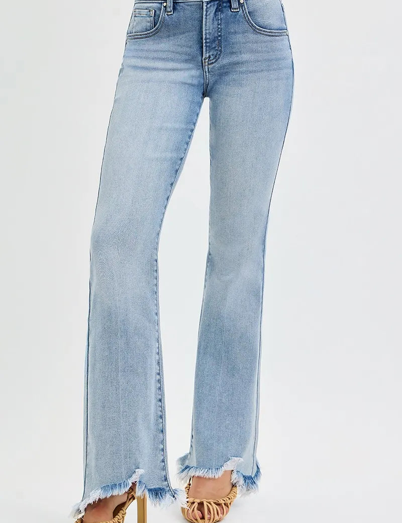 RISEN Full Size Tummy Control Mid Rise Flare Jeans with Fray Hem Detailed Plus Size on Simply Obsessed