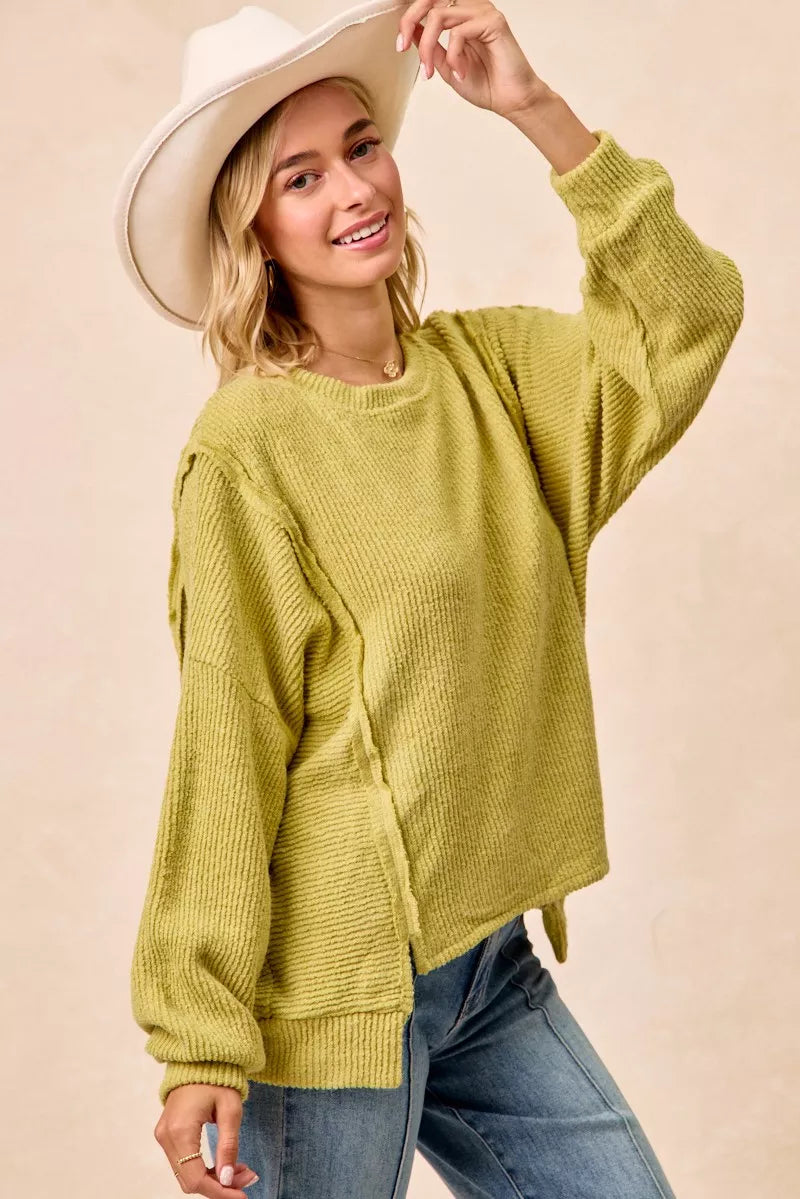BIBI Boucle Rib Knit Uneven Hem Sweater With Open Seam on Simply Obsessed
