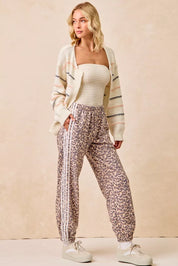 BIBI Side Lines Leopard Track Pants on Simply Obsessed