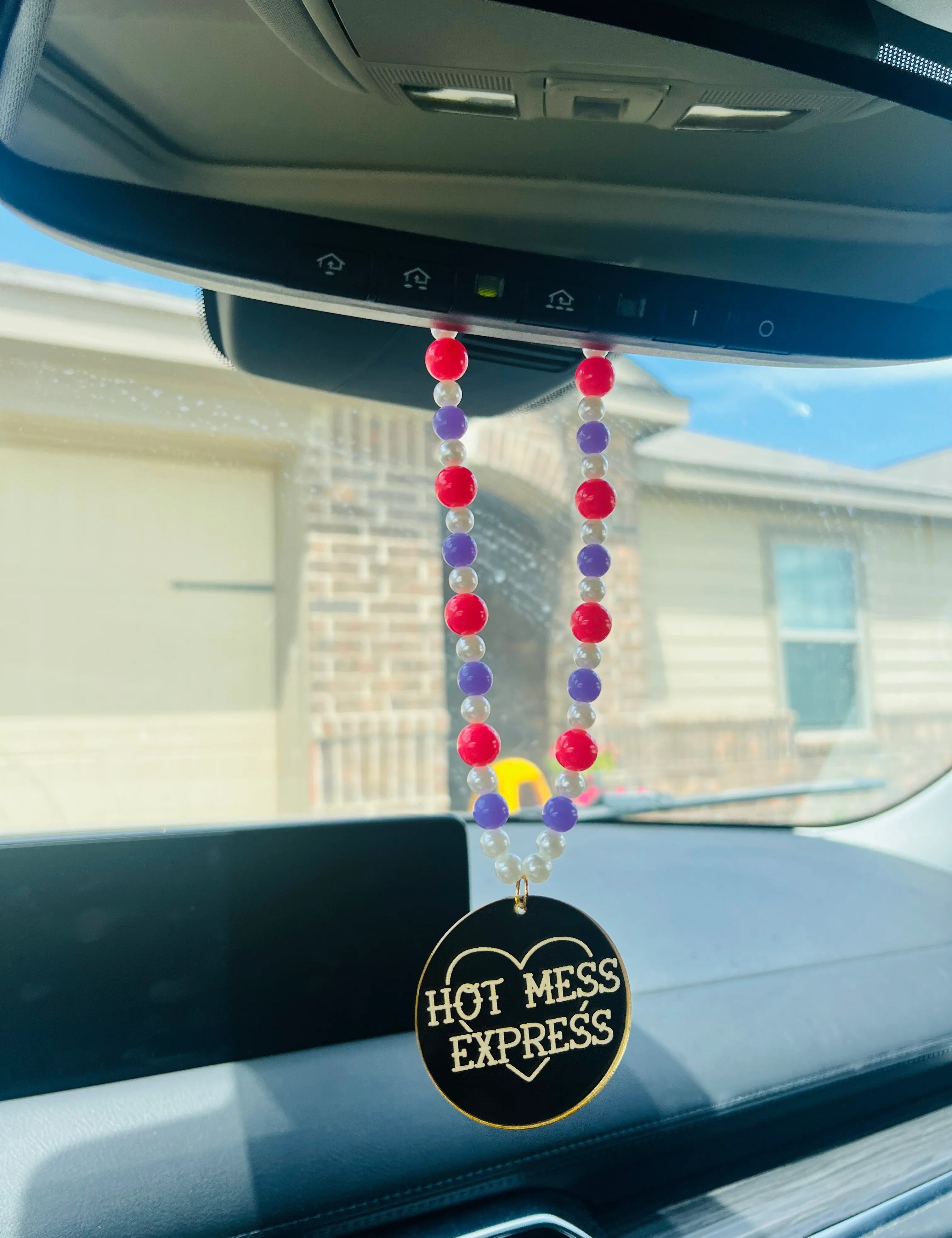 DIXIE ROSE Gold Hot Mess Express Car Charm on Simply Obsessed