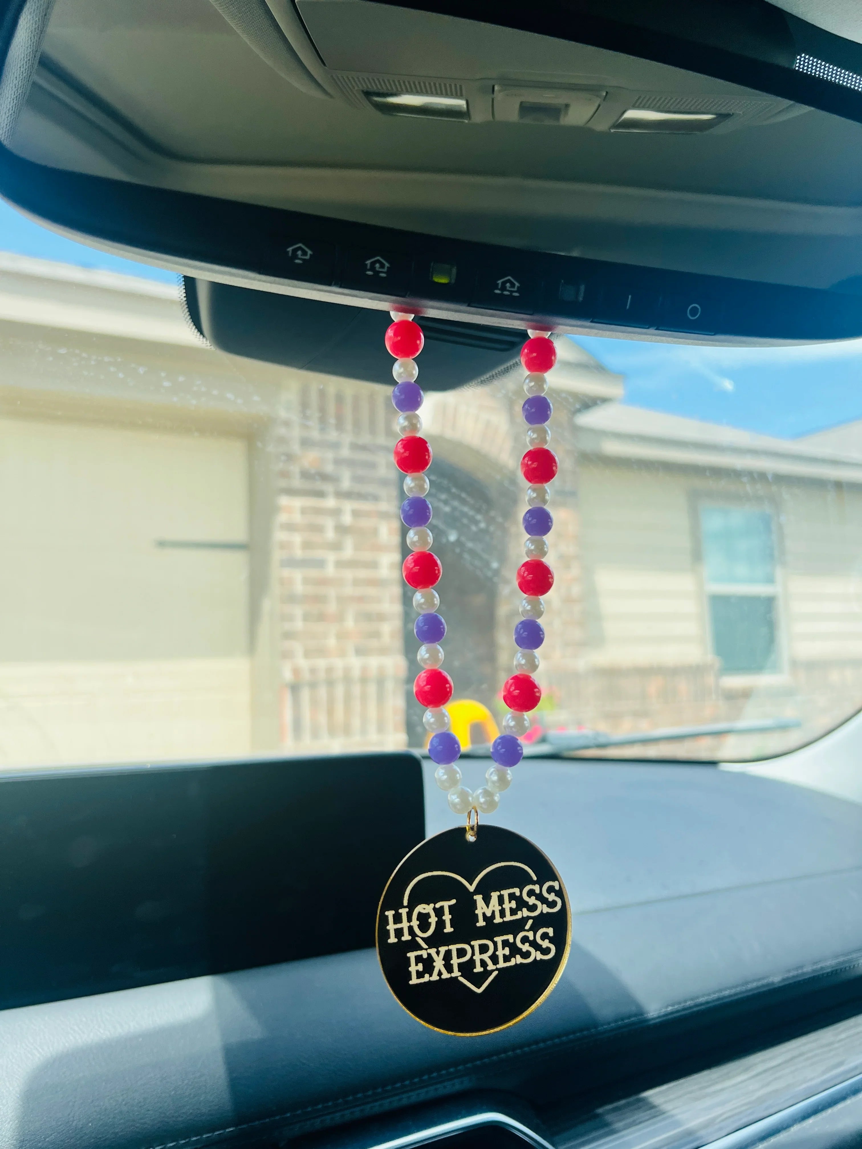 DIXIE ROSE Gold Hot Mess Express Car Charm on Simply Obsessed