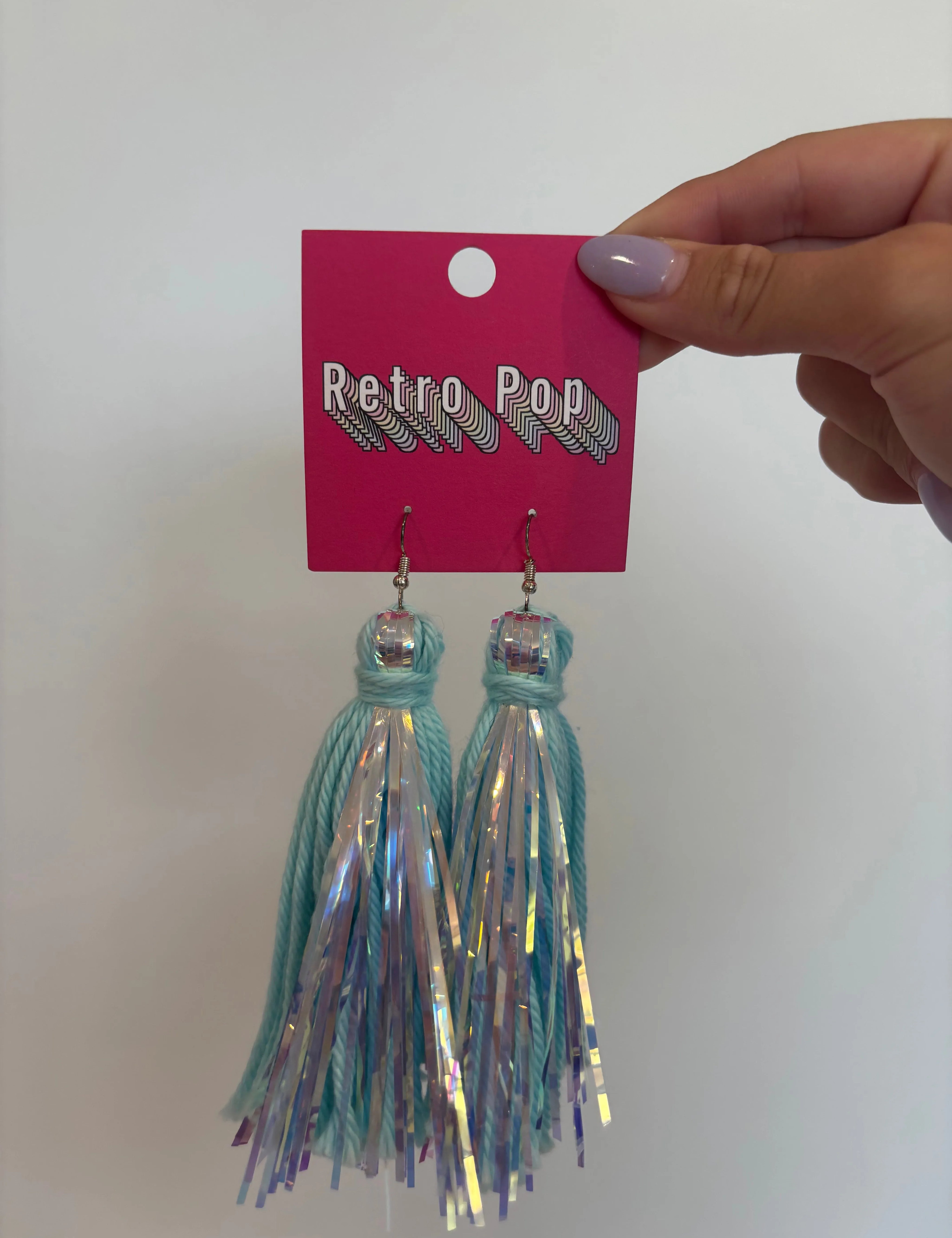 DIXIE ROSE Light Blue Iridescent Tassel Earrings on Simply Obsessed