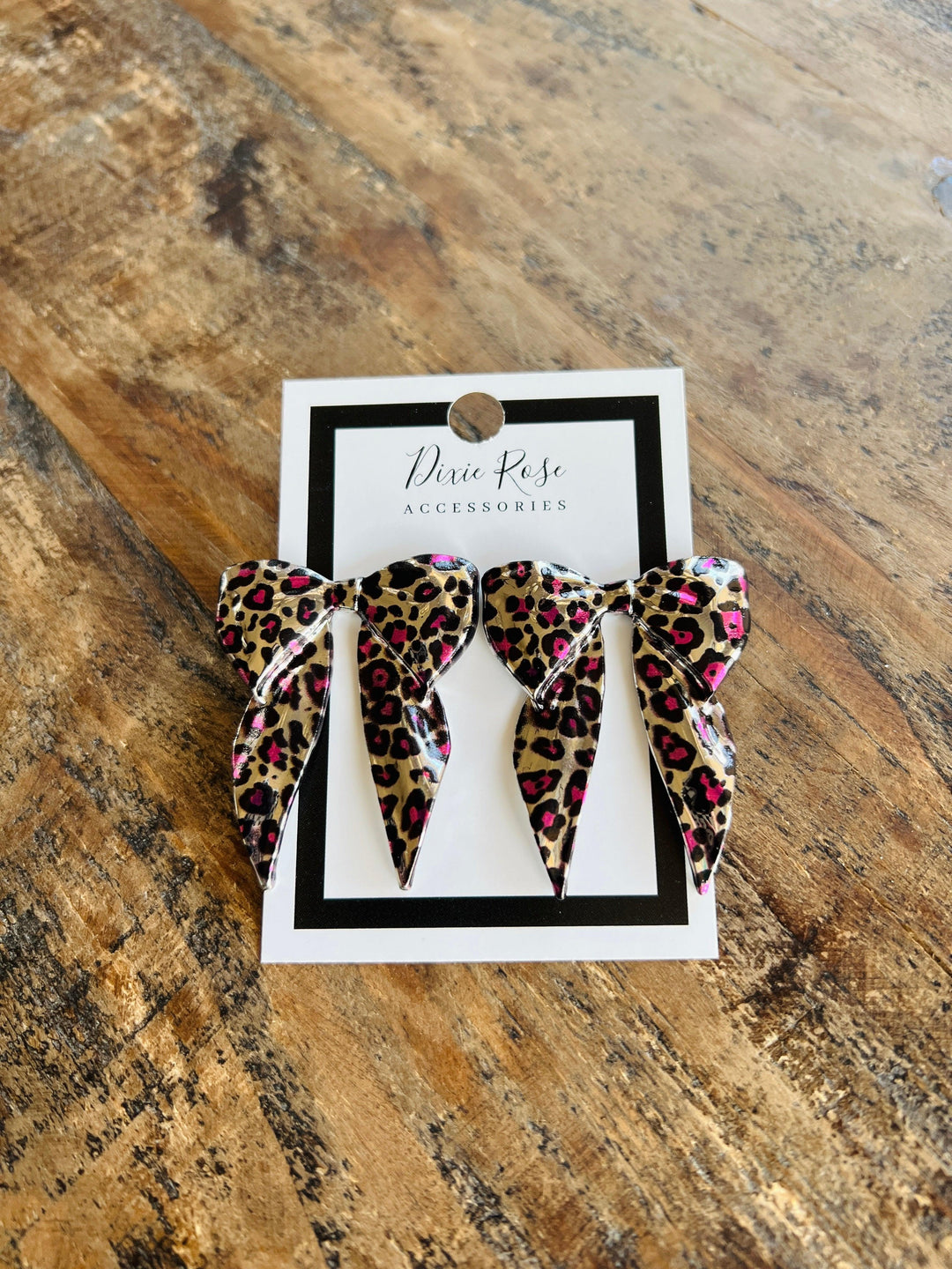 DIXIE ROSE Pink Leopard Bow Earrings on Simply Obsessed