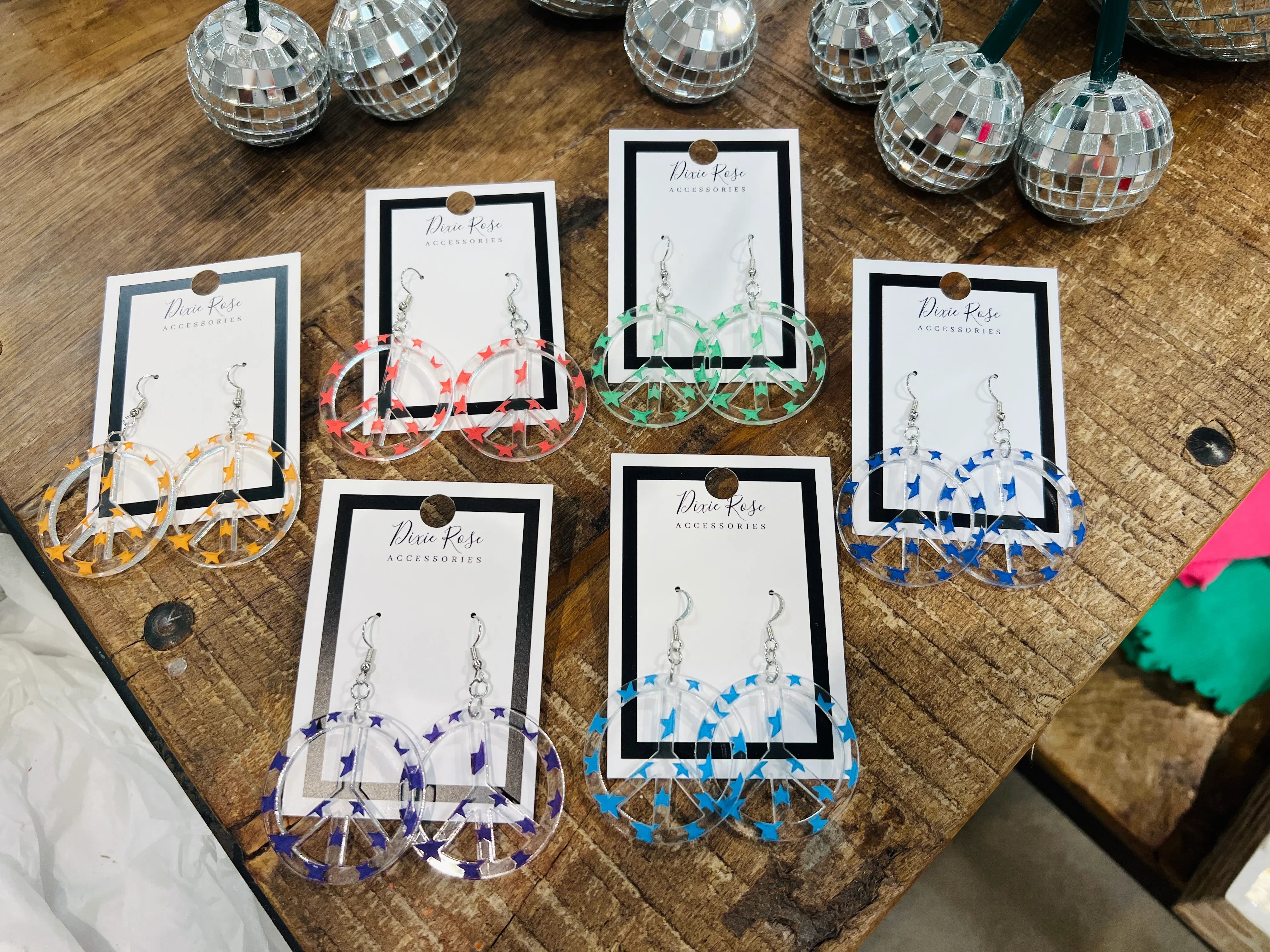 DIXIE ROSE Star Peace Sign Earrings on Simply Obsessed