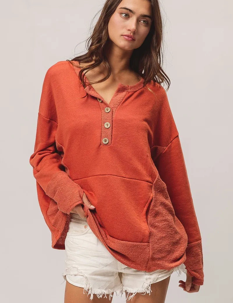 BiBi French Terry Knit Side Block Buttoned Henley Top on Simply Obsessed