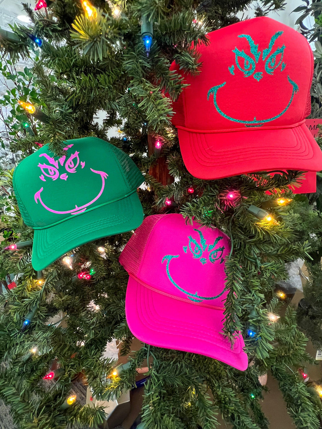 Glitter Grinch Trucker Hat by Malibu Hippie on Synergy Marketplace